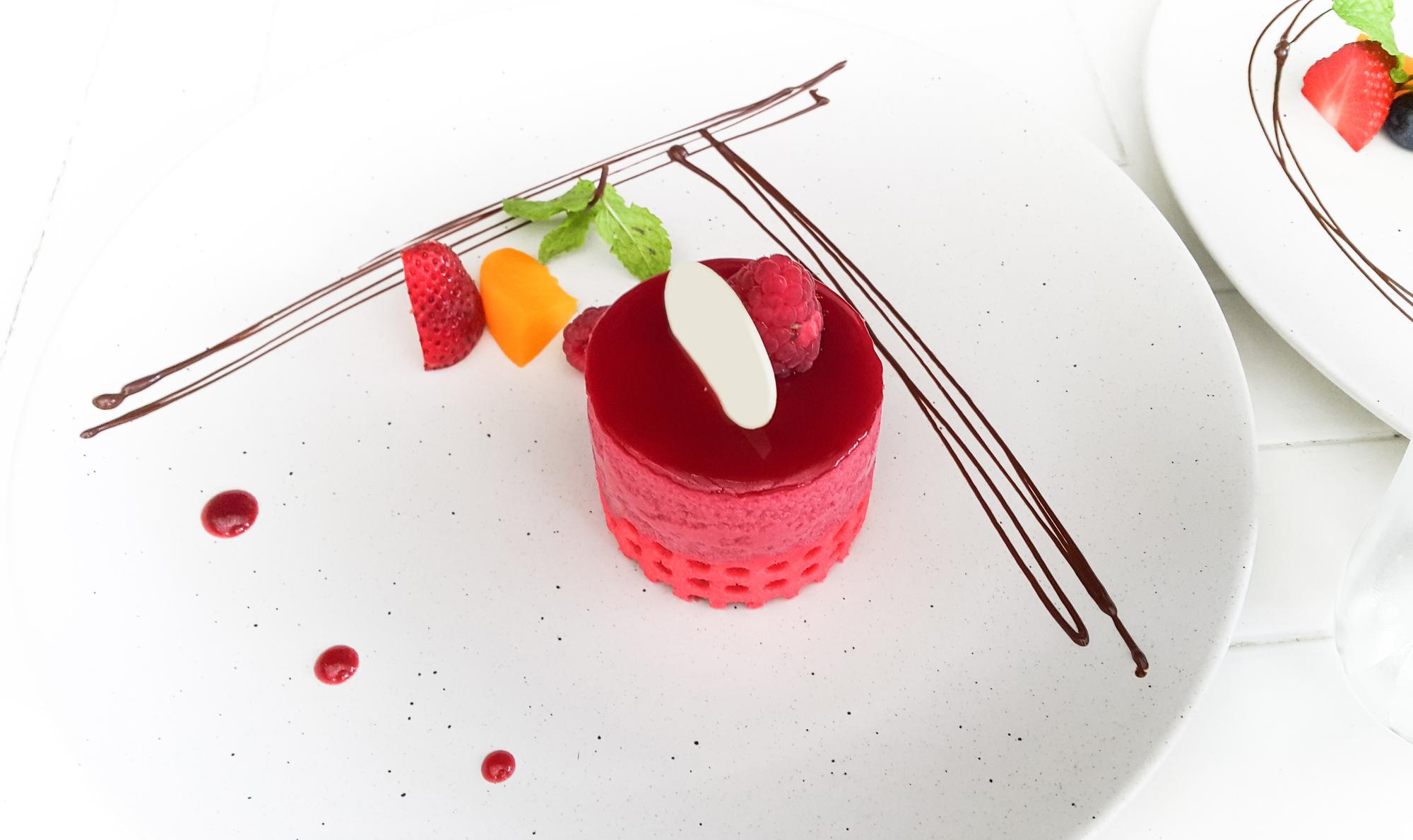 Precision plating close-up with molecular garnish